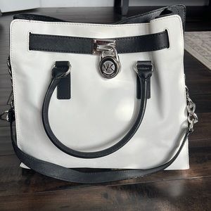 Black and white Michael Kors purse
